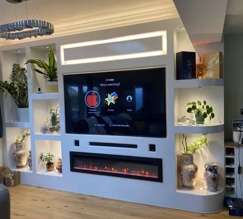 Living room with a bespoke illuminated media wall