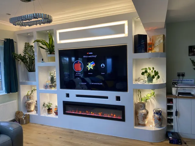 Living room with a bespoke illuminated media wall